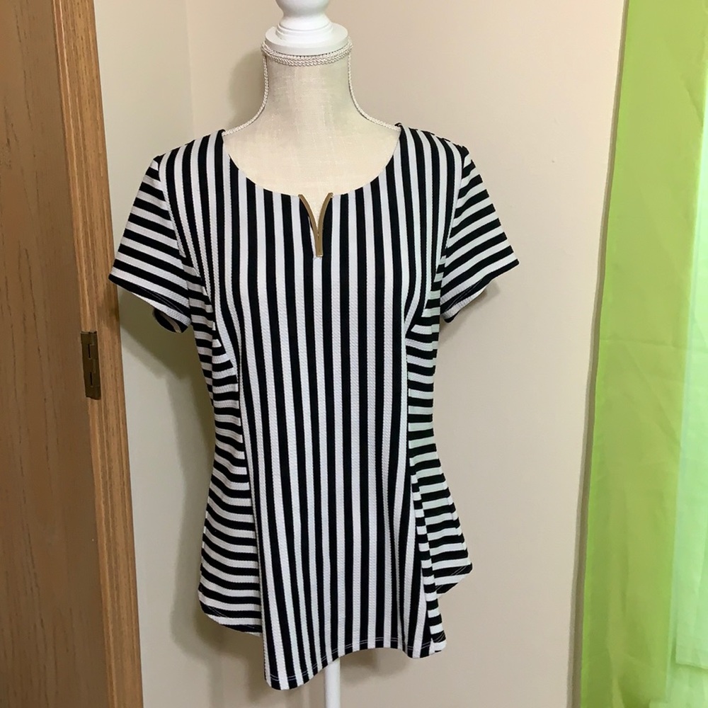 Alyx L black and white striped form fitting v neck blouse with metal detail